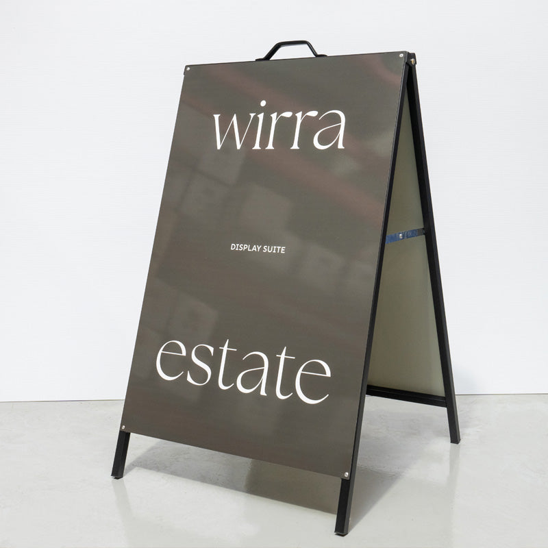 A-frame sign with 'wirra' and 'estate' text on a white background using Aluminium panels with wrapped graphics