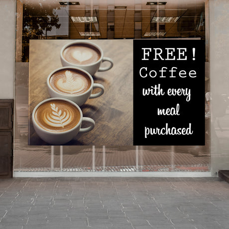 Vinyl Banner applied to a glass window shopfront of a coffee shop. SS Signs Online Store can produce your banner to any design and size you need