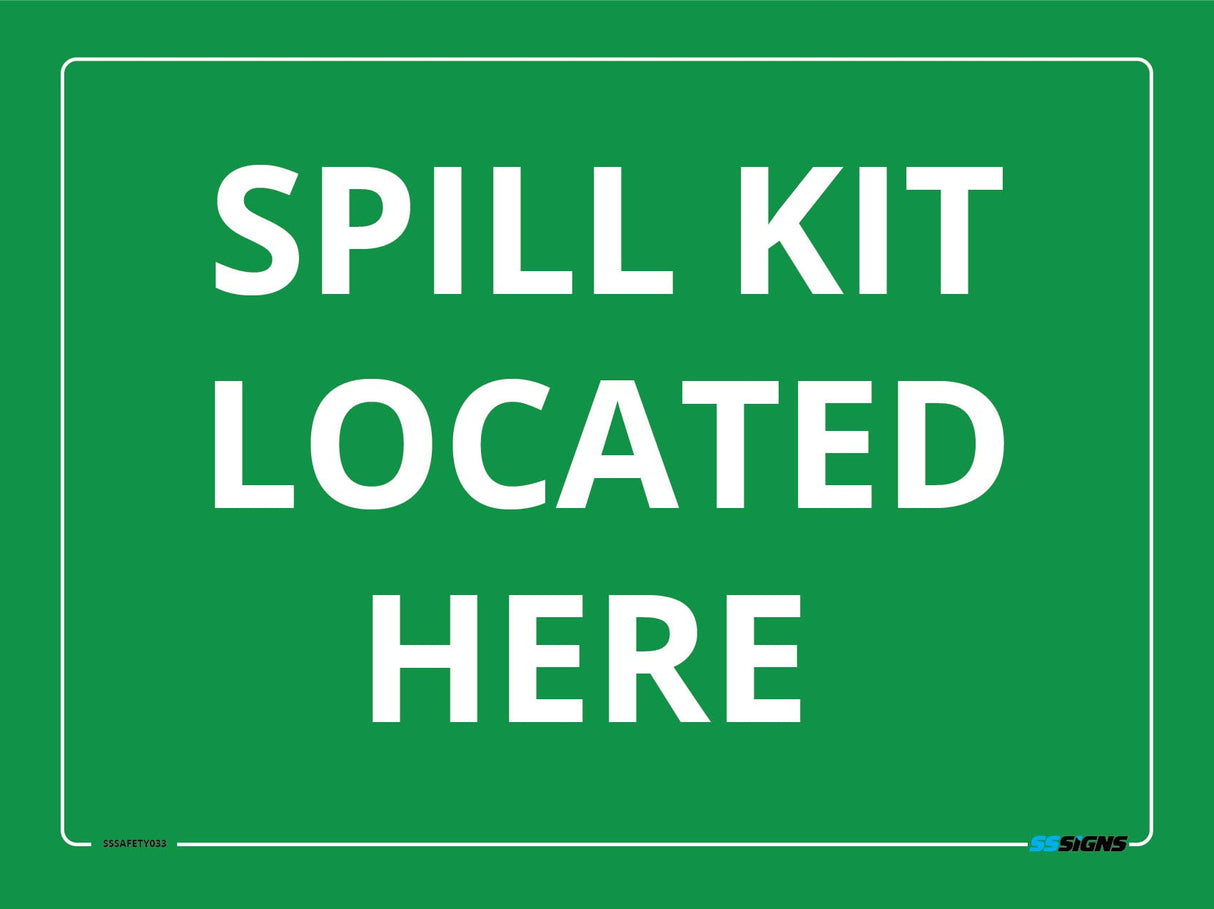 Green sign with white text 'SPILL KIT LOCATED HERE' on a green background