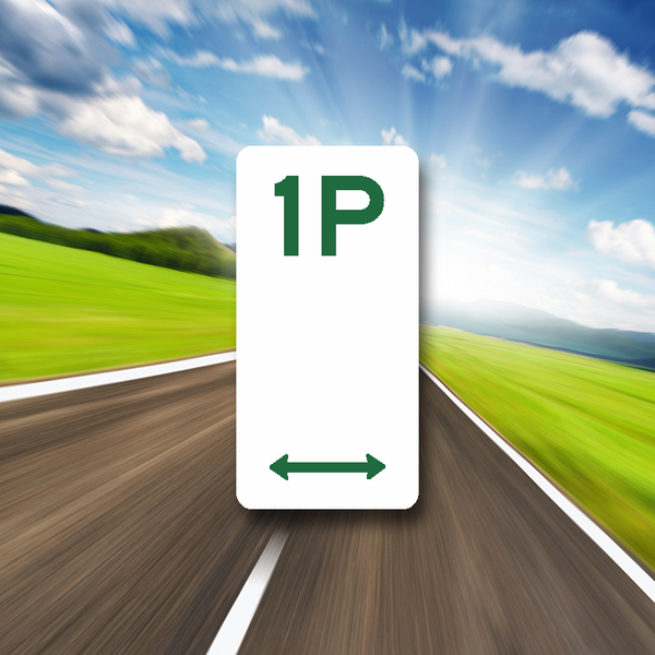 A green 'P' shaped parking sign with a directional arrow, set against a blurred background of a road.