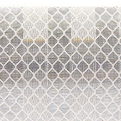 Close-up of 3M white, diamond grade reflective series tape. The best reflective tape in the market
